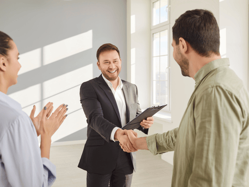 Young couple meeting with their realtor