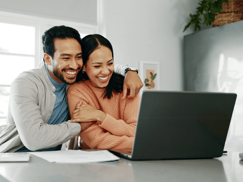 Young couple reviewing their finances